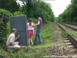 A tramp jerks off while adhering a clamp fucking into public notice